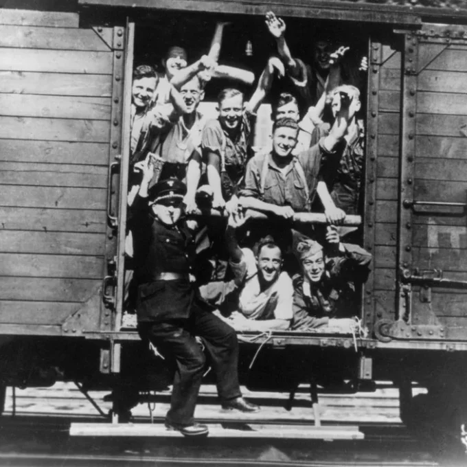 Unbekannt_-_German_soldiers_in_a_railway_wagon_France_August_1940_-_(MeisterDrucke-717622)